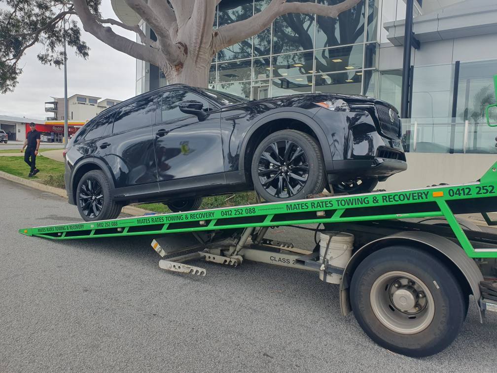 Dealership vehicle delivery by Mates Rates Towing Perth