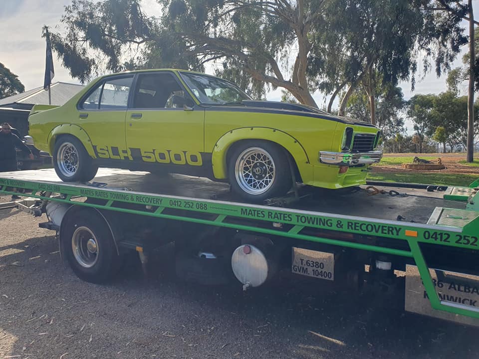 Race car being transported on tow truck Perth